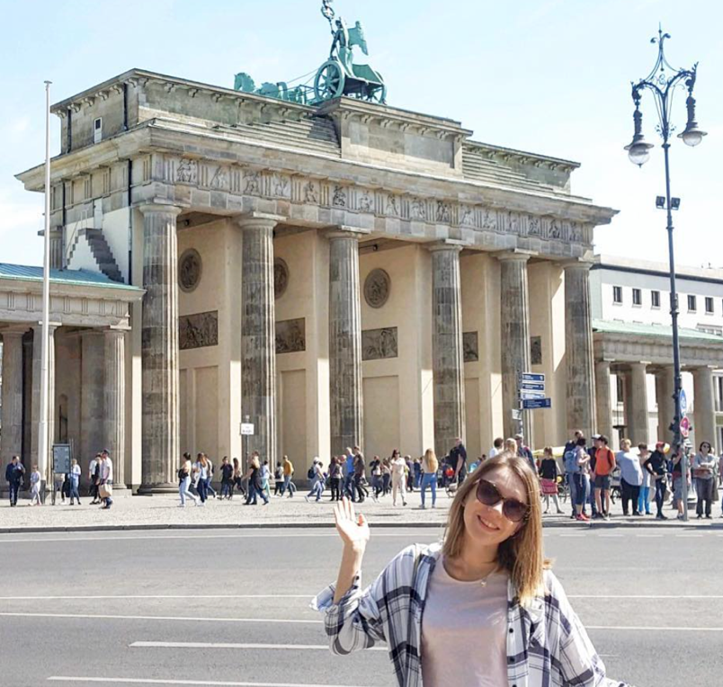 Posing outside Brandenburg Gate in Berlin